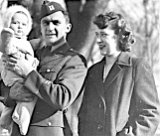 Captain Edwin Rufenacht, holding daughter Barbara, and wife, Lydia.